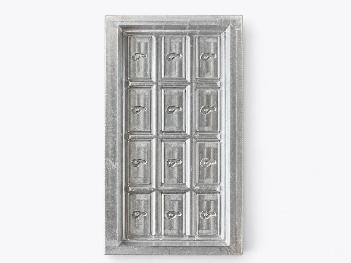 Twelve-cavity machined aluminum mother tooling for custom polycarbonate chocolate mold production