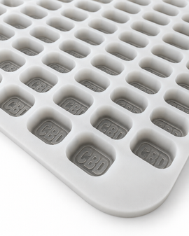 Angled view of 4mL brick gummy mold with 185 embossed cavities