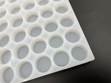 5,6 ml monety gumowatej